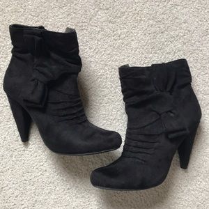 Black suede bowtie heeled booties